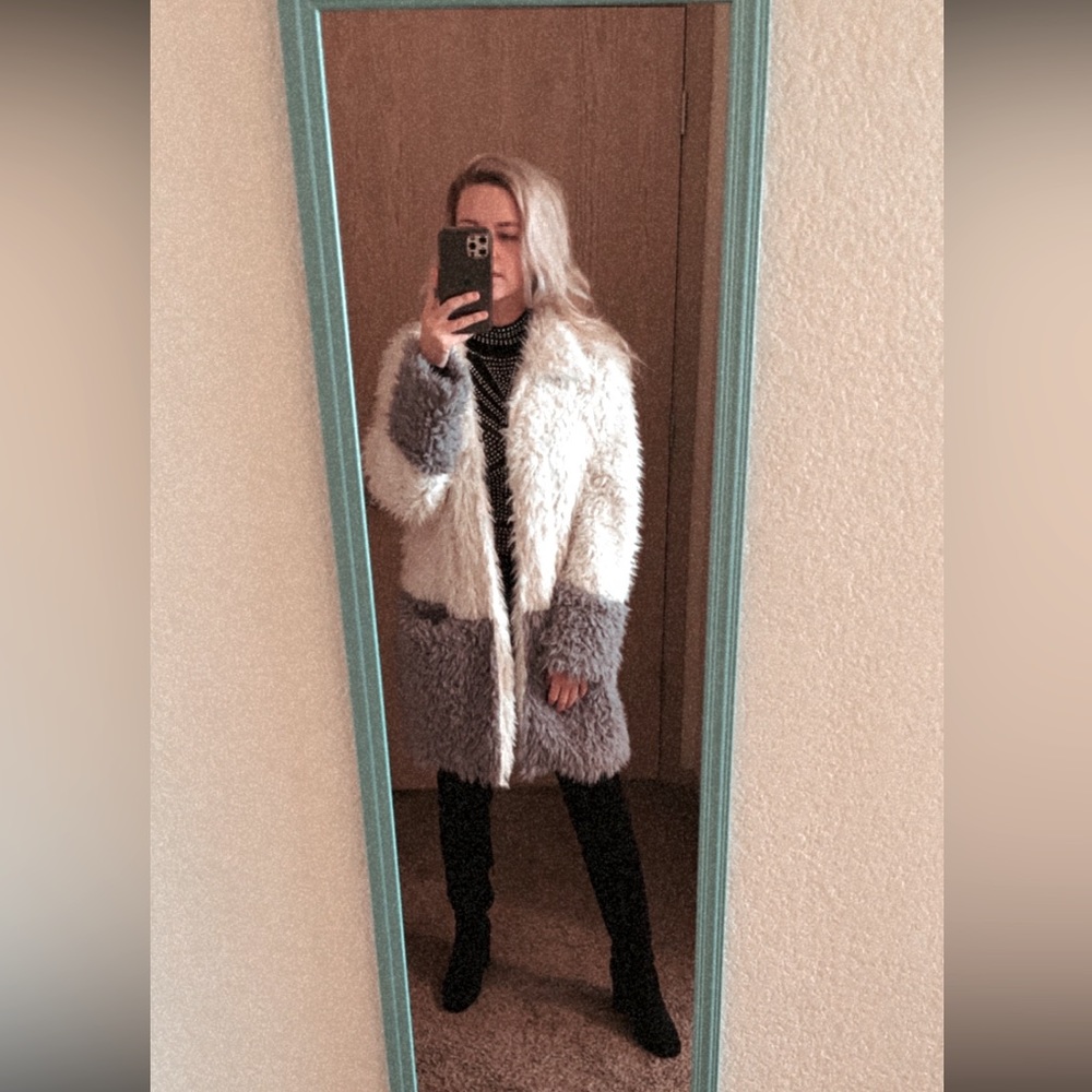 long fuzzy coat, thin but warm.